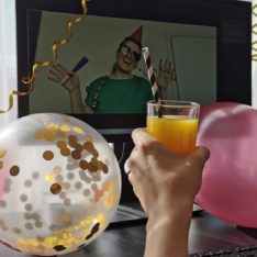 woman celebrating at a virtual party