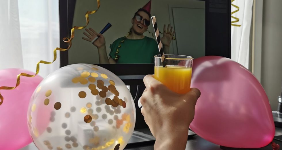 woman celebrating at a virtual party